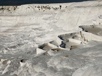 High angle view of salt covered terraces at pamukkale aturkeyturkey
