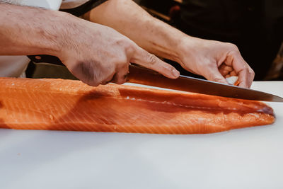 Close-up of person preparing food