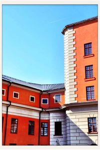 Low angle view of building against blue sky