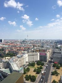 View of city against cloudy sky