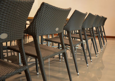 Empty chairs and tables in restaurant