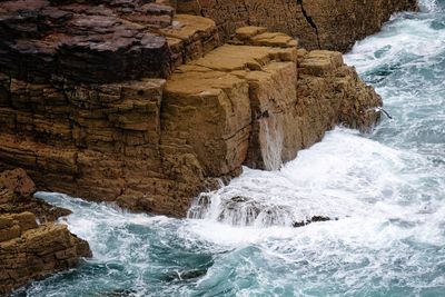 Scenic view of rocks in sea