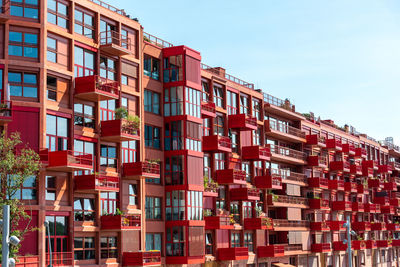 Modern red apartment building seen in berlin, germany