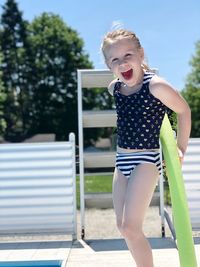 Portrait of a girl standing outdoors