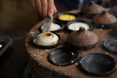 Close-up of person preparing food