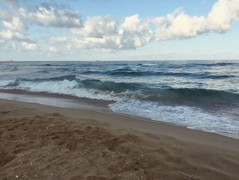 Scenic view of beach against sky