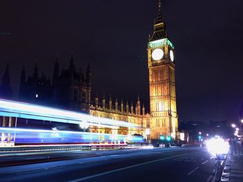 Illuminated big ben at night