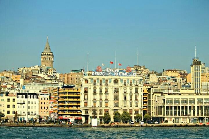 building exterior, architecture, built structure, waterfront, water, clear sky, river, city, nautical vessel, tower, travel destinations, copy space, canal, travel, church, blue, famous place, transportation, rippled, residential building