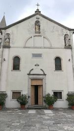 Facade of temple against sky