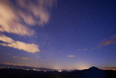 Scenic view of star field against sky at night