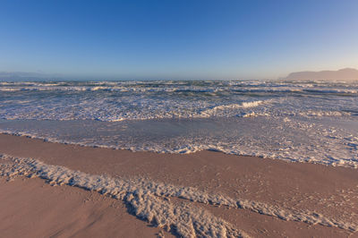 View of the beach near  muizenberg, popular place among surfers, western cape province.