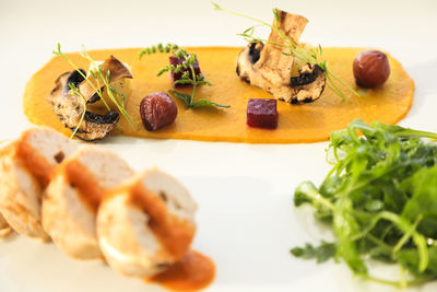 Close-up of fruits in plate on table