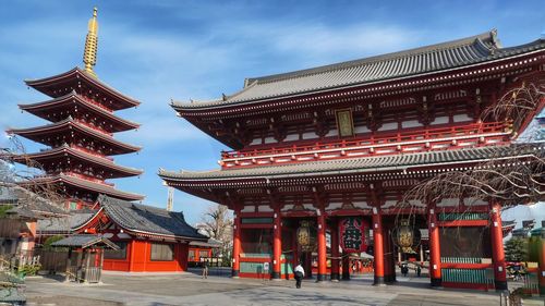 Low angle view of pagoda against sky in city