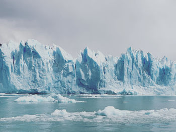 Scenic view of frozen scene at perito moreno glacier against sky