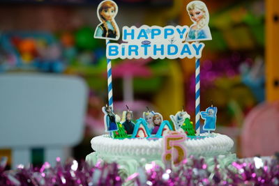 Close-up of cake with text