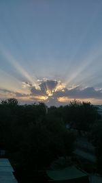 High angle view of silhouette trees against sky during sunset