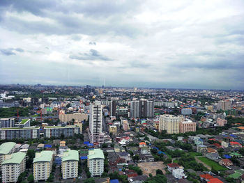 High angle view of buildings against sky in city