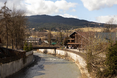 Iron bridge over a mountain river