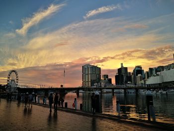 Scenic view of river against sky during sunset