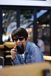 Portrait of man having coffee at cafe