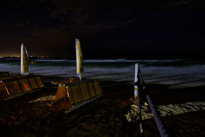 Scenic view of sea against sky at night