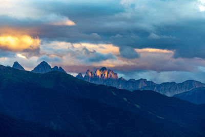 Scenic view of mountains against sky during sunset