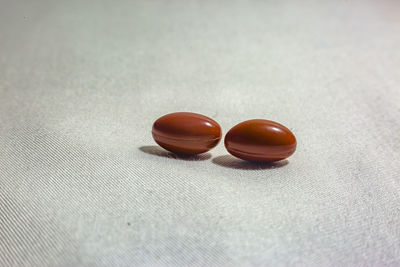 Close-up of chocolates on fabric