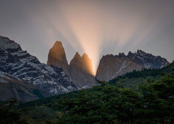 Scenic view of mountains against sky during sunset