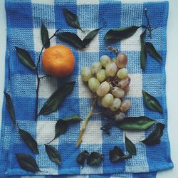 High angle view of fruits on napkin