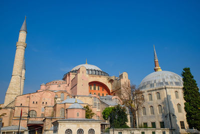 Cathedral of building against clear blue sky