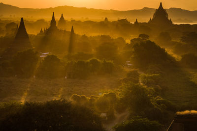 Panoramic view of landscape against sky during sunset