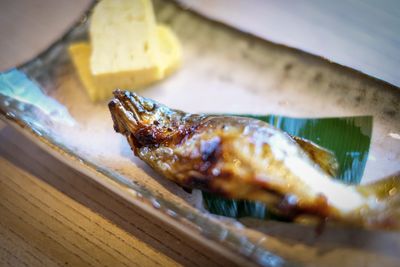 Close-up of meat on barbecue grill