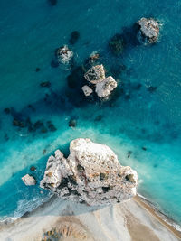 High angle view of rock formation in sea