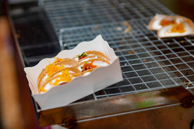 Close-up of food on barbecue grill