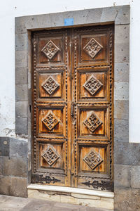 Close-up of closed door of old building
