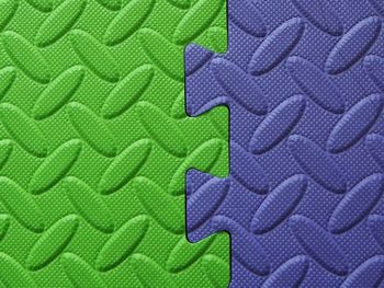 Full frame shot of green and blue jigsaw pieces