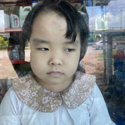 Close-up portrait of cute girl