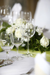 Close-up of wineglasses on table