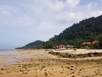 Scenic view of beach against sky