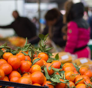 Close-up of oranges for sale at market stall