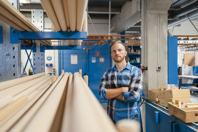 Portrait of man working in factory