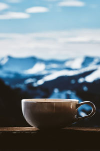 Close-up of coffee cup on table