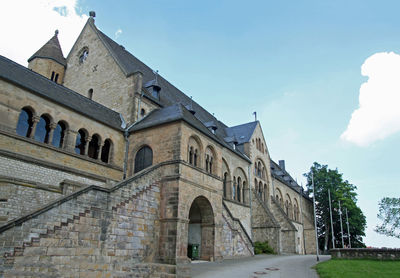 Low angle view of old building against sky