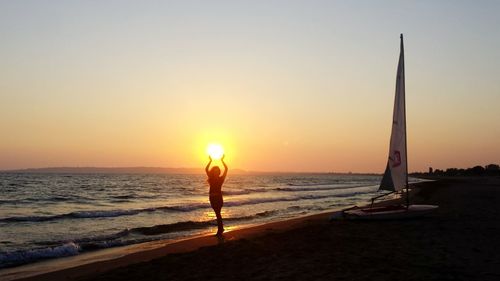 Scenic view of sea at sunset