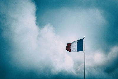 Low angle view of flag against sky