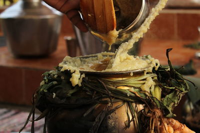 Celebrating tamil thai pongal festival to sun god with sakkarai and ven pongal in traditional method