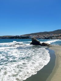 Scenic view of sea against clear blue sky