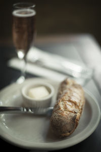 Close-up of bread in plate on table