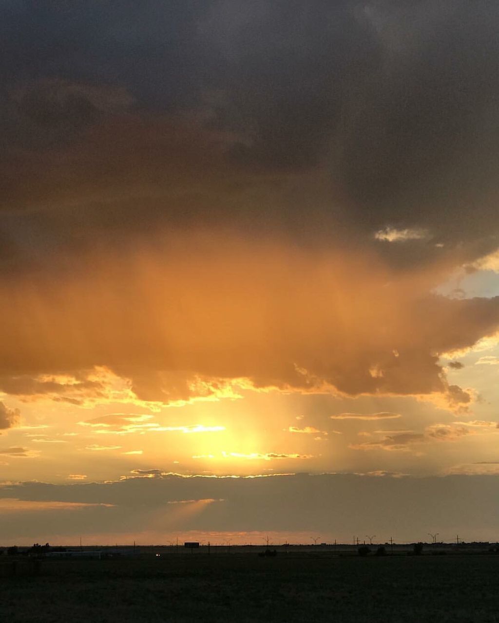 SCENIC VIEW OF SILHOUETTE LANDSCAPE AGAINST DRAMATIC SKY