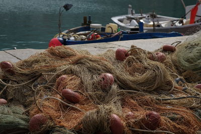 High angle view of fishing boats moored at harbor